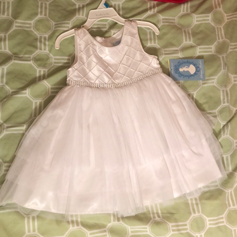 Gorgeous white Baby Dress. Never worn. Brand new